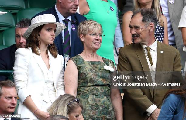 Emma Watson and Sir Mark and Lady Rylance in the royal box on centre court on day twelve of the Wimbledon Championships at the All England Lawn...