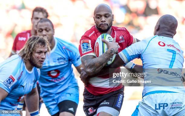 Lionel Mapoe of the Lions with possession during the Super Rugby match between Emirates Lions and Vodacom Bulls at Emirates Airline Park on July 14,...