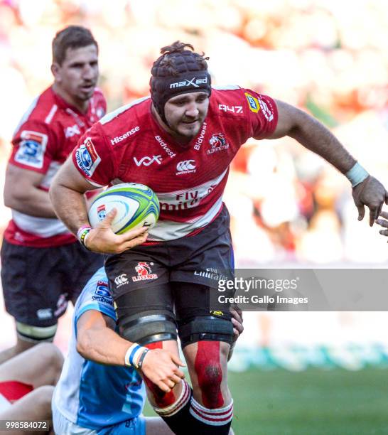 Cyle Brink of the Lions with possession during the Super Rugby match between Emirates Lions and Vodacom Bulls at Emirates Airline Park on July 14,...