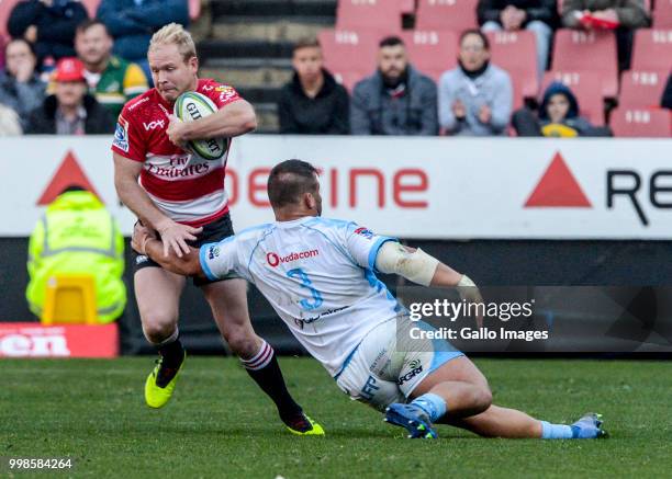 Ross Cronje of the Lions with possession during the Super Rugby match between Emirates Lions and Vodacom Bulls at Emirates Airline Park on July 14,...