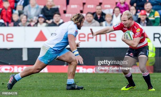 Ross Cronje of the Lions with possession during the Super Rugby match between Emirates Lions and Vodacom Bulls at Emirates Airline Park on July 14,...