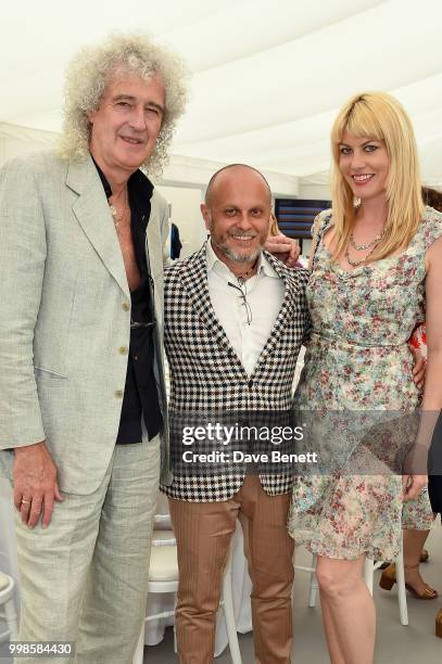 Brian May, Sergio Momo and Meredith Ostrom attend the Xerjoff Royal Charity Polo Cup 2018 on July 14, 2018 in Newbury, England.