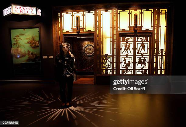 Woman admires a 1928 lift from Selfridges department store in the new 'Galleries of Modern London' exhibition in the Museum of London on May 18, 2010...