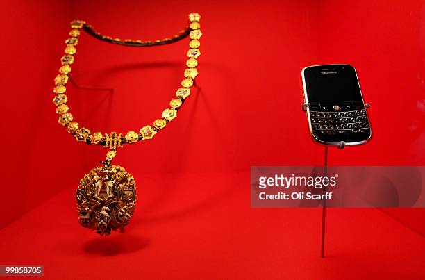 Blackberry smartphone is displayed adjacent to a mayoral chain as an illustration of modern and historic symbols of affluence, in the new 'Galleries...