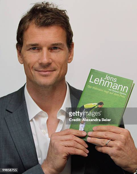 Former German national goalkeeper Jens Lehmann poses for photographers during the presentation of his book 'Der Wahnsinn liegt auf dem Platz' at...