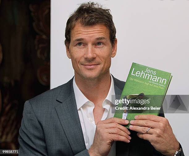 Former German national goalkeeper Jens Lehmann poses for photographers during the presentation of his book 'Der Wahnsinn liegt auf dem Platz' at...