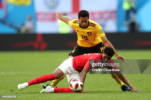 Marcus Rashford of England is challenged by Moussa Dembele of Belgium during the 2018 FIFA World Cup Russia 3rd Place Playoff match between Belgium...