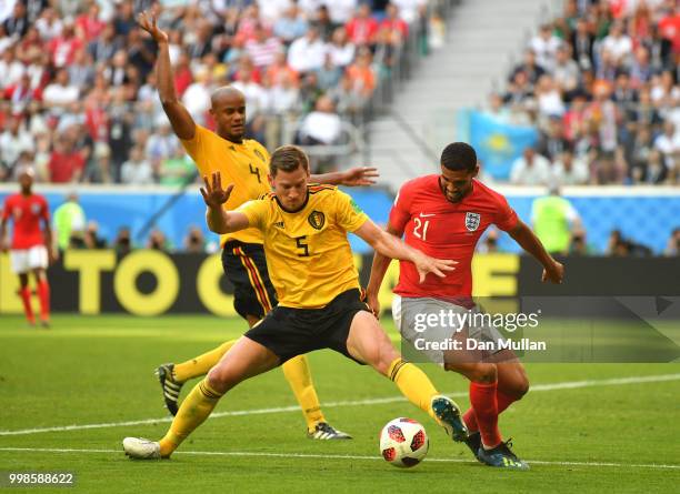 Jan Vertonghen of Belgium tackles Ruben Loftus-Cheek of England during the 2018 FIFA World Cup Russia 3rd Place Playoff match between Belgium and...