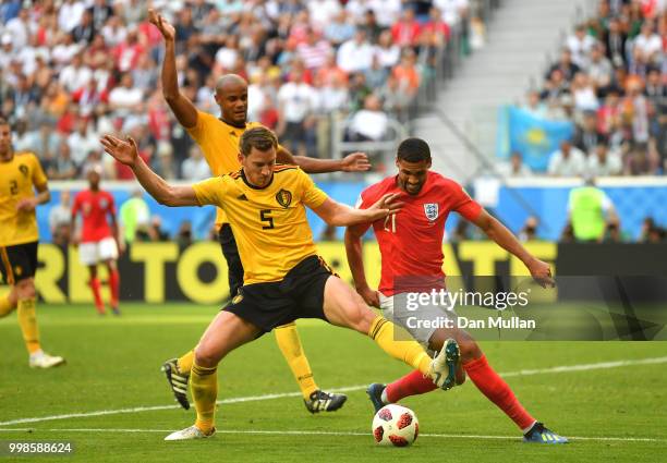 Jan Vertonghen of Belgium tackles Ruben Loftus-Cheek of England during the 2018 FIFA World Cup Russia 3rd Place Playoff match between Belgium and...