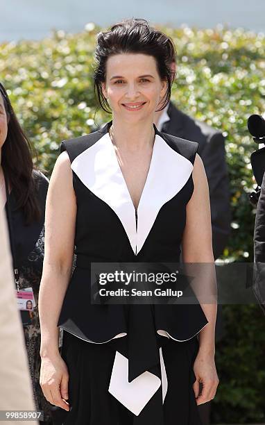Actress Juliette Binoche arrives at the "Certified Copy" Photocall at the Palais des Festivals during the 63rd Annual Cannes Film Festival on May 18,...