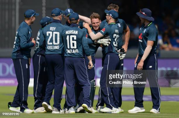 Jos Buttler is congratulated after catching KL Rahul during the 2nd Royal London One-Day International between England and India at Lord's Cricket...