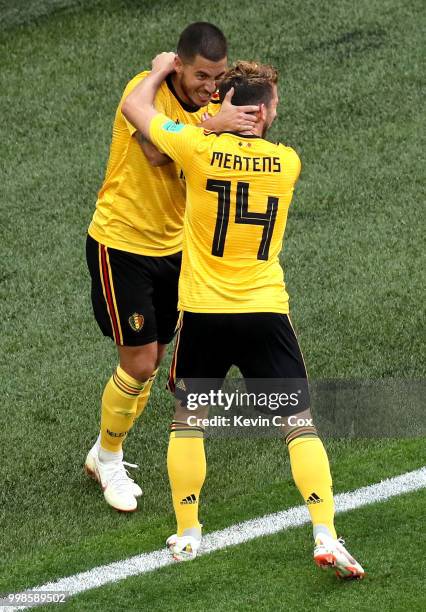 Eden Hazard of Belgium celebrates with teammate Dries Mertens after scoring his team's second goal during the 2018 FIFA World Cup Russia 3rd Place...