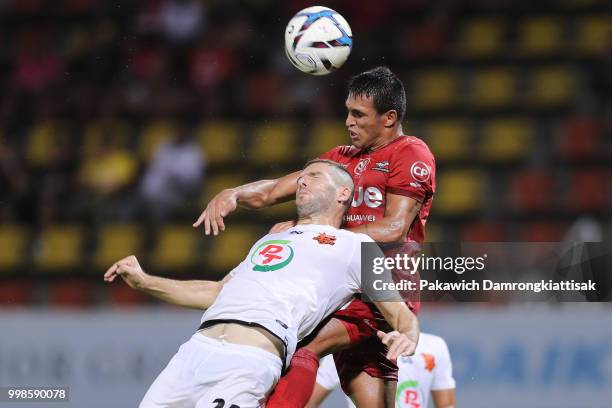 Robson Dos Santos Fernandes of True Bangkok United and Orahovac Adnan of PT Prachuap FC compete for the ball during the Thai League 1 match between...