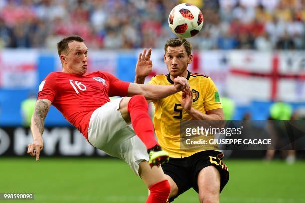 England's defender Phil Jones makes a bicycle kick past Belgium's defender Jan Vertonghen during their Russia 2018 World Cup play-off for third place...