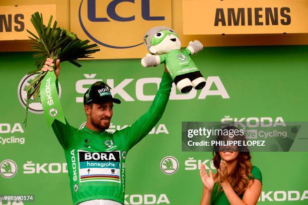 Slovakia's Peter Sagan, wearing the best sprinter's green jersey, celebrates on the podium after the eighth stage of the 105th edition of the Tour de...