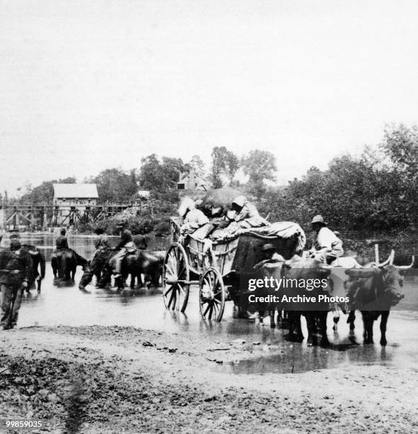 Fugitive black people cross the Rappahannock, fleeing General 'Stonewall' Jackson's advancing confederate troops during the first battle of...