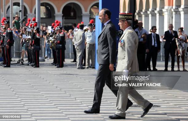 French Prime Minister Edouard Philippe is pictured in Nice on July 14 during a ceremony for the second anniversary of attacks on the French coastal...