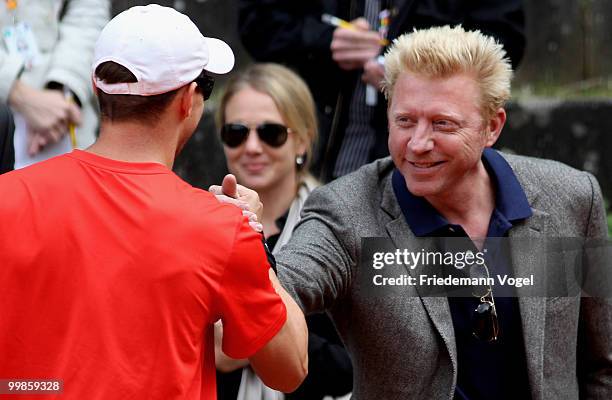 Mike Bryan of USA and Boris Becker shake hands during day three of the ARAG World Team Cup at the Rochusclub on May 18, 2010 in Duesseldorf, Germany.