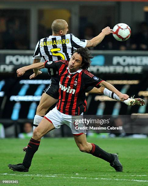 Filippo Inzaghi of AC Milan battles for the ball against Fabio Cannavaro of Juventus FC during the Serie A match between AC Milan and Juventus FC at...