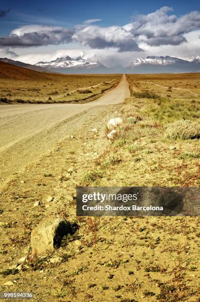 el calafate patagonia - argentina dirt road panorama stock pictures, royalty-free photos & images