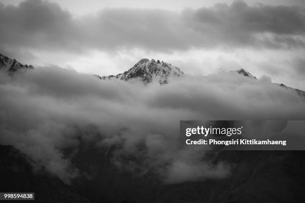 monochrome close-up landscape view of snowcapped-mountain in nubra valley, leh ladakh, india - nubra valley stock pictures, royalty-free photos & images