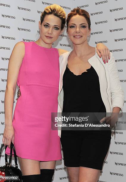 Actresses Laura Chiatti and Claudia Gerini attend 'Profumo Di Donna' Event held at Nespresso Boutique on May 18, 2010 in Milan, Italy.
