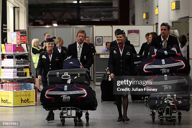 Kevin Pietersen and Captain, Paul Collingwood of England return with the World Twenty20 Cup Trophy at Gatwick Airport on May 18, 2010 in London,...