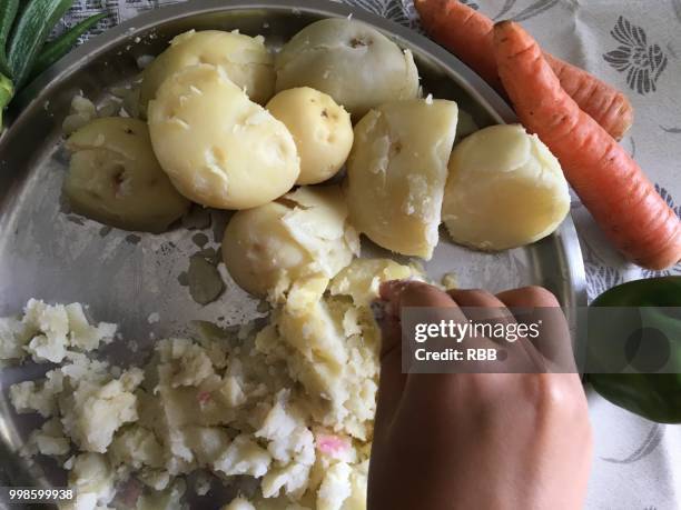 mashed potato for veg cutlets - mashed stock pictures, royalty-free photos & images