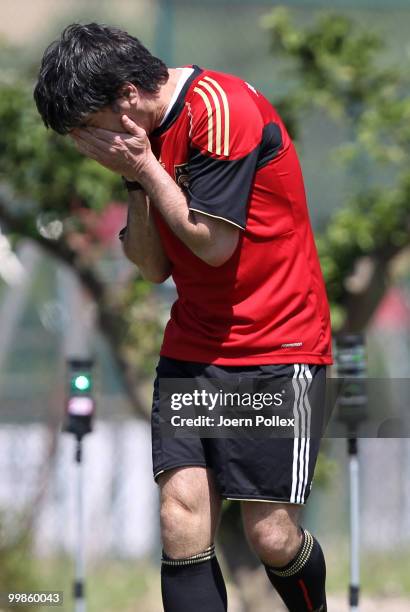 Head coach Joachim Loew of Germany gestures during the German National Team training session at Verdura Golf and Spa Resort on May 18, 2010 in...