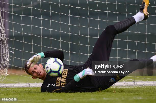Goalkeeper Martin Dubravka dives to save the ball during the Newcastle United Training session at Carton House on July 14 in Kildare, Ireland.
