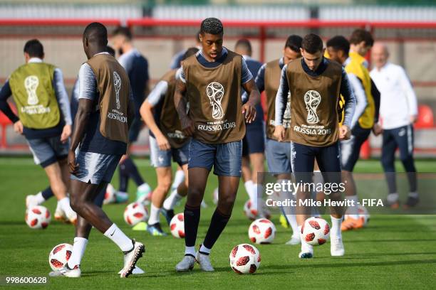 Presnel Kimpembe of France controls the ball during a France training session during the 2018 FIFA World Cup at Luzhniki Stadium on July 14, 2018 in...