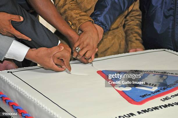 Sandton police celebrate their third birthday witrh a cake during a parade in preperation for the 2010 World Cup on May 17, 2010 in Sandton,...