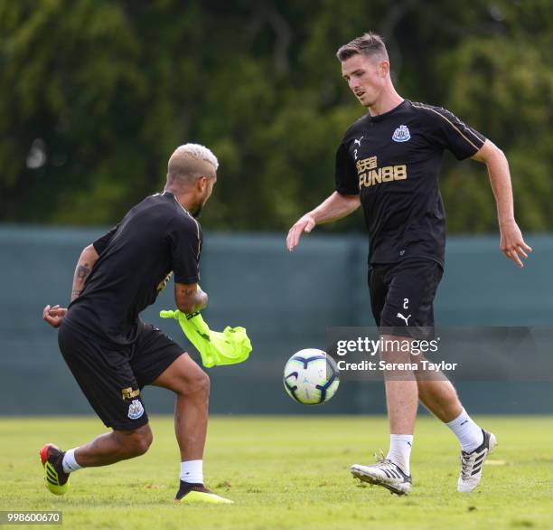 Ciaran Clark looks to take on DeAndre Yedlin during the Newcastle United Training session at Carton House on July 14 in Kildare, Ireland.