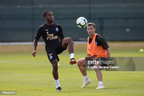 Rolando Aarons controls the ball whilst Jamie Sterry looks to challenge during the Newcastle United Training session at Carton House on July 14 in...
