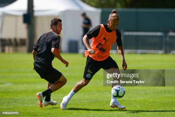 Dwight Gayle controls the ball whilst Javier Manquillo looks to challenge during the Newcastle United Training session at Carton House on July 14 in...