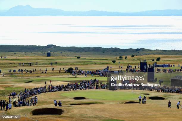 Lee Westwood looks on with his caddy on hole six during day three of the Aberdeen Standard Investments Scottish Open at Gullane Golf Course on July...