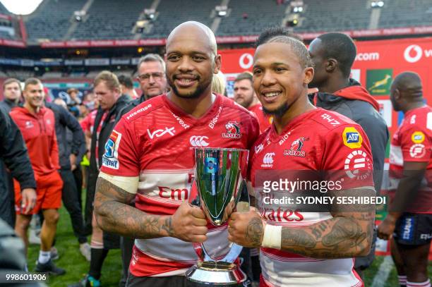 Lionel Mapoe of the Lions and Elton Jantjies of the Lions during the Super Rugby match between Emirates Lions and Vodacom Bulls at Emirates Airline...