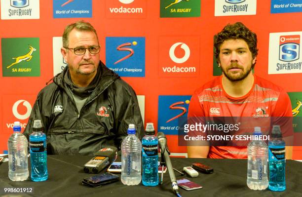 Captain Warren Whiteley of the Lions and Coach Swys de Bruin of the Lions during the Super Rugby match between Emirates Lions and Vodacom Bulls at...