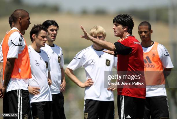 Head coach Joachim Loew of Germany instructs during the German National Team training session at Verdura Golf and Spa Resort on May 18, 2010 in...