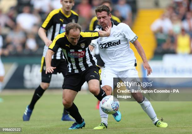Notts County's David Vaughn and Derby County's Craig Bryson during the pre-season match at Meadow Lane, Nottingham.