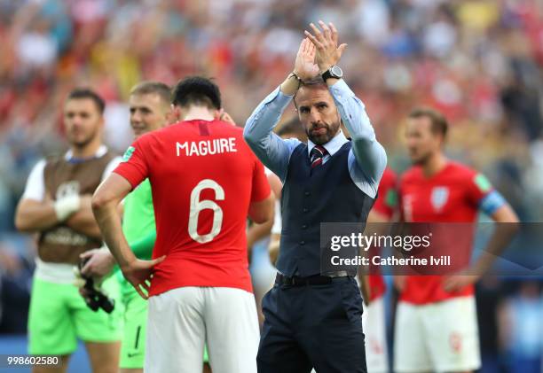 Gareth Southgate, Manager of England applauds fans after the 2018 FIFA World Cup Russia 3rd Place Playoff match between Belgium and England at Saint...