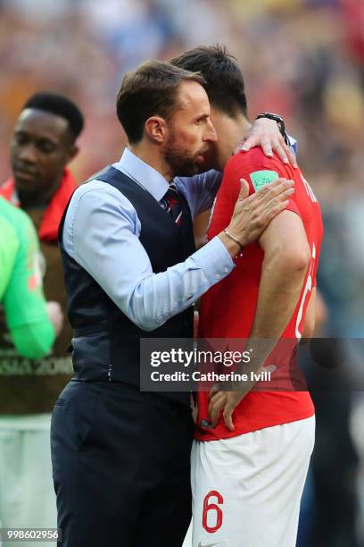 Gareth Southgate, Manager of England speaks with Harry Maguire of England after the 2018 FIFA World Cup Russia 3rd Place Playoff match between...