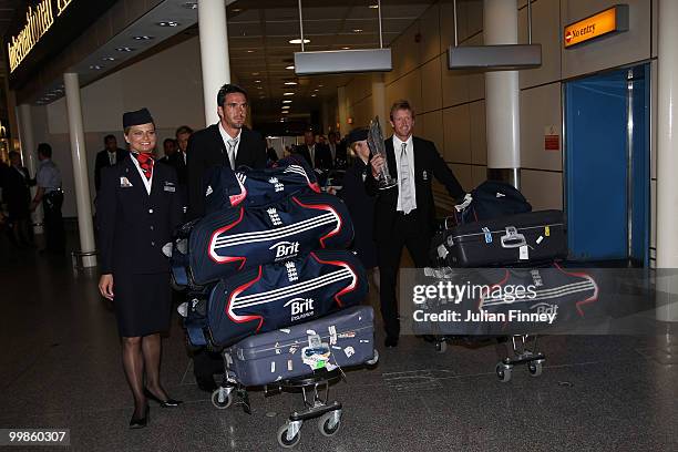 Kevin Pietersen and Captain, Paul Collingwood of England with the World Twenty20 Cup Trophy as they return at Gatwick Airport on May 18, 2010 in...