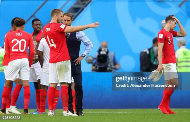 Gareth Southgate, Manager of England speaks with Eric Dier of England after the 2018 FIFA World Cup Russia 3rd Place Playoff match between Belgium...