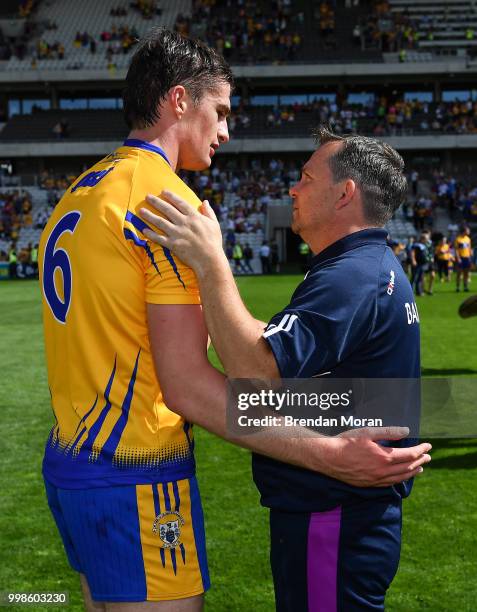 Cork , Ireland - 14 July 2018; Wexford manager Davy Fitzgerald congratulates Conor Cleary of Clare after the GAA Hurling All-Ireland Senior...