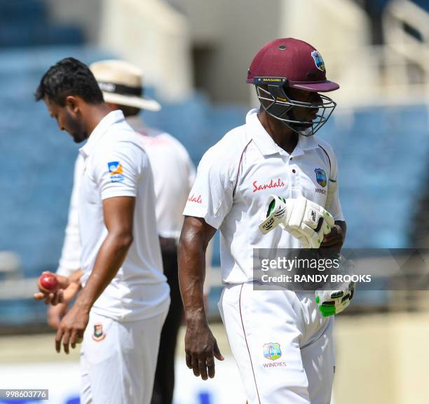 Devon Smith of West Indies is dismissed by Shakib Al Hasan of Bangladesh during day 3 of the 2nd Test between West Indies and Bangladesh at Sabina...