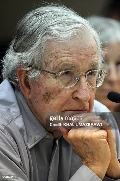 Renowned Jewish-American scholar and political activist Noam Chomsky waits to speaks during a scheduled lecture at Bir Zeit University by video...