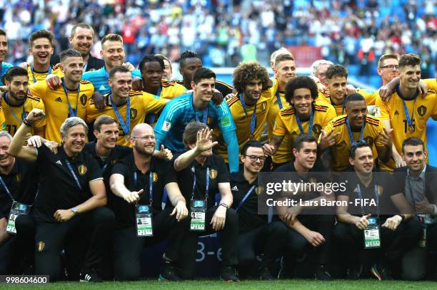 Belgium players pose for a photo after recieving their third place medals during the 2018 FIFA World Cup Russia 3rd Place Playoff match between...