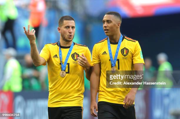 Eden Hazard and Youri Tielemans of Belgium celebrate after recieving their third place medals after the 2018 FIFA World Cup Russia 3rd Place Playoff...
