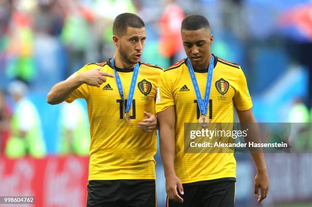 Eden Hazard and Youri Tielemans of Belgium celebrate after recieving their third place medals after the 2018 FIFA World Cup Russia 3rd Place Playoff...